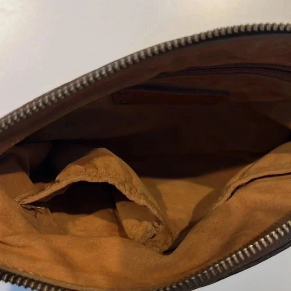 Patricia Nash Cassini Wristlet with tooled floral pattern in Florence Brown